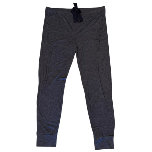 Dark blue jogger pants on a white background