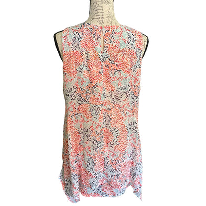Back of Floral patterned sleeveless top on a mannequin against a white background