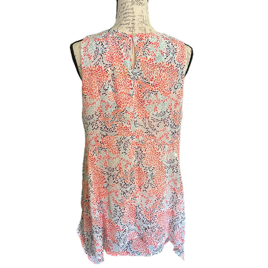Back of Floral patterned sleeveless top on a mannequin against a white background