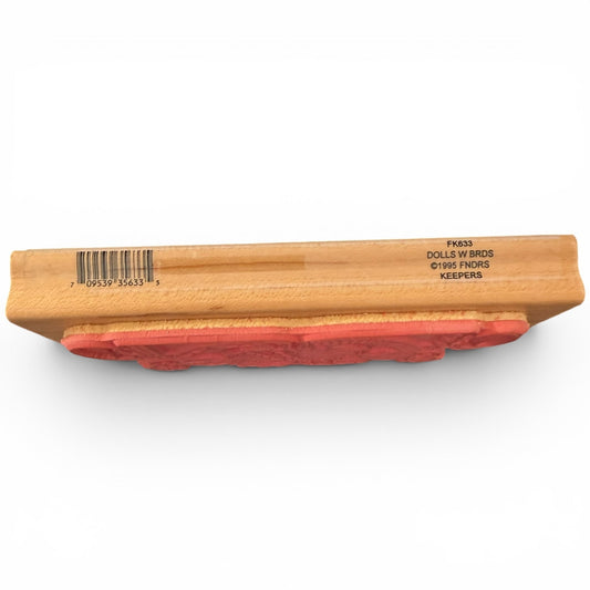 Wooden block with red stamp and visible branding on a white background