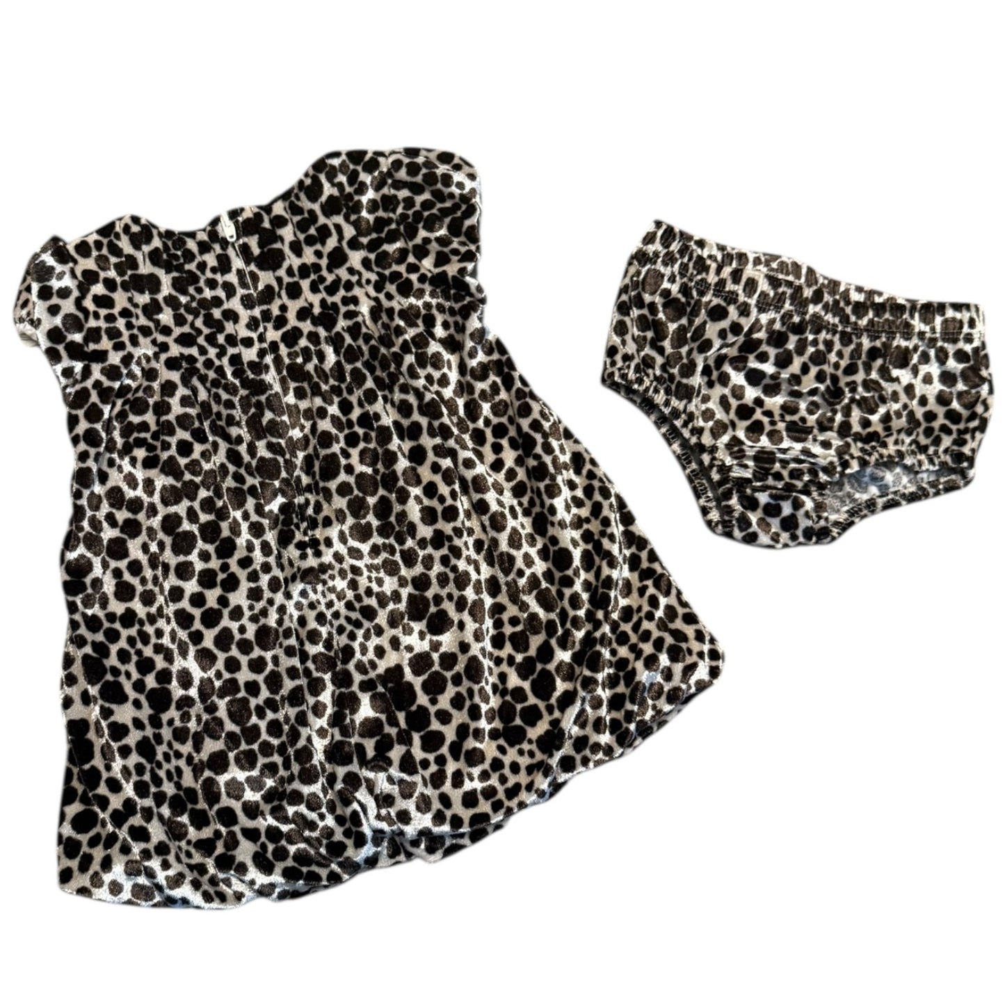 Leopard print baby dress with matching shorts on a white background
