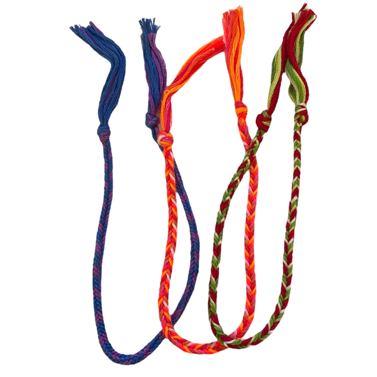 3 Colorful braided bracelets on a white background