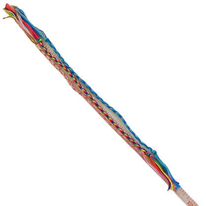 Colorful braided bracelets on a white background