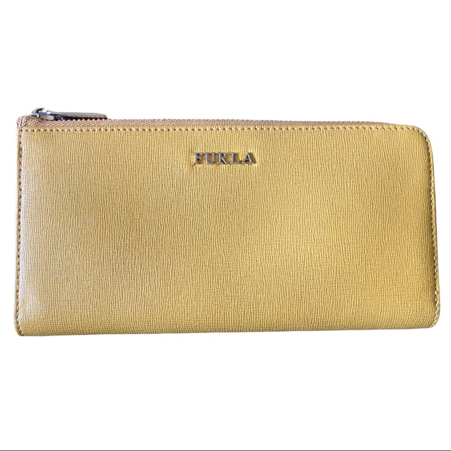 A yellow leather zip-around wallet with the brand name 'FURLA' embossed in gold-tone lettering on the front, set against a plain white background.