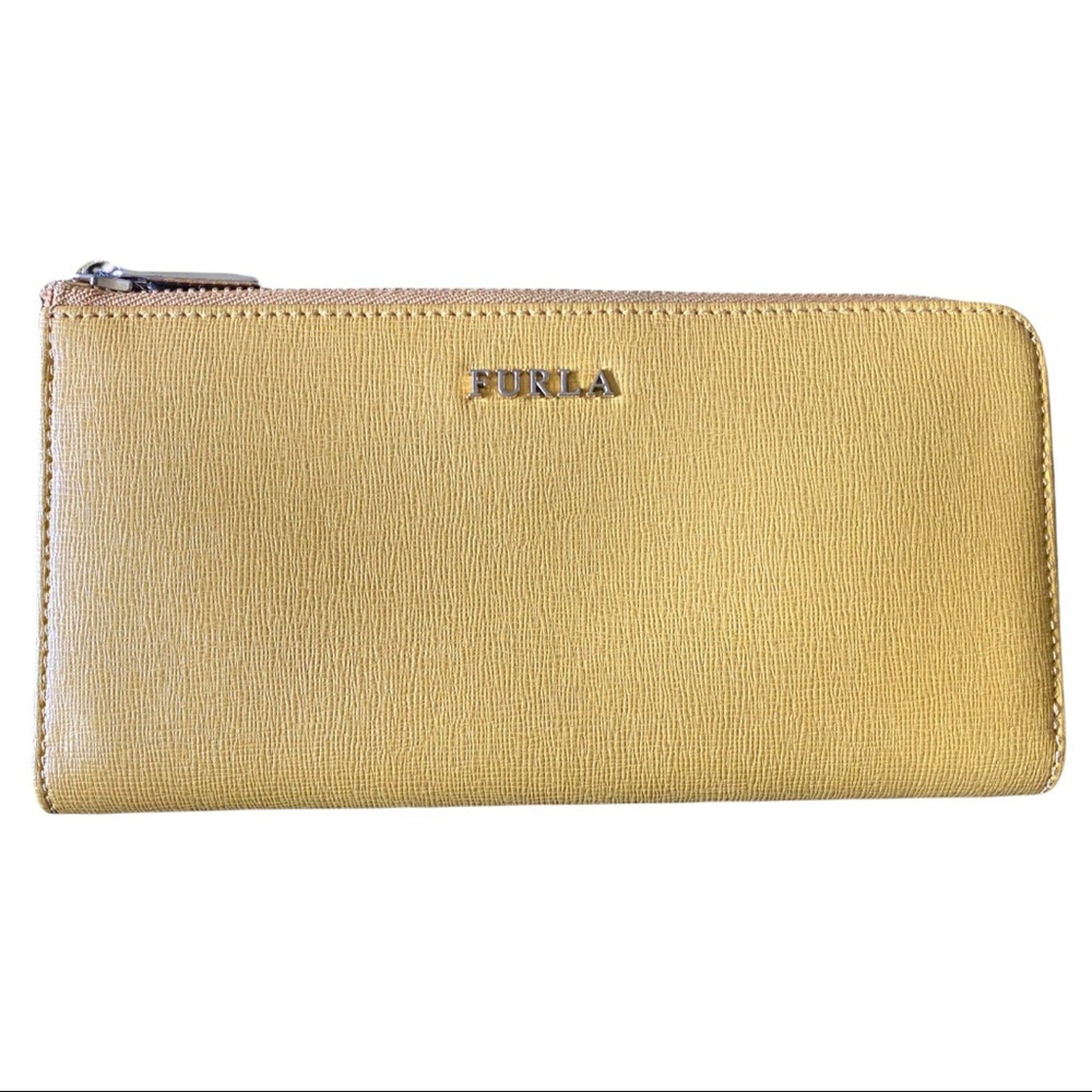 A yellow leather zip-around wallet with the brand name 'FURLA' embossed in gold-tone lettering on the front, set against a plain white background.