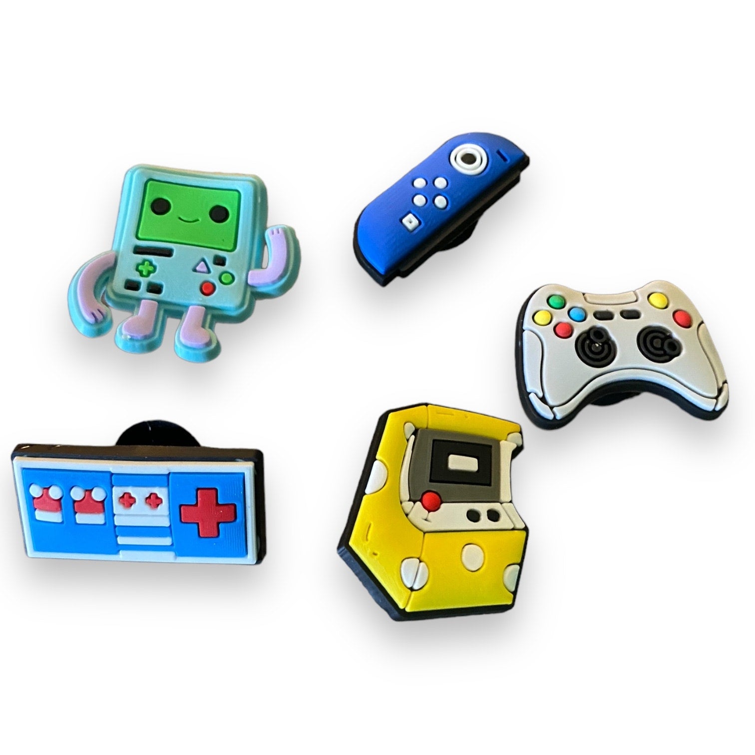 Set of 5 video game shoe charms on a white background 