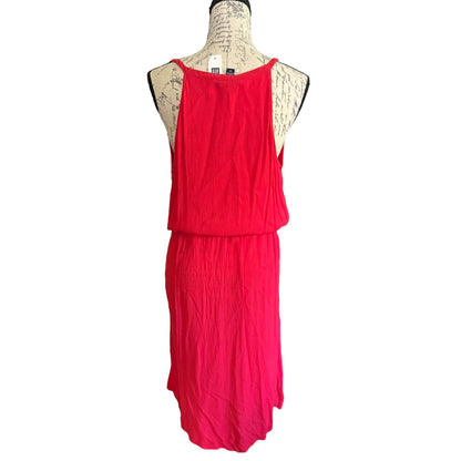 Back of Red dress on a mannequin against a white background