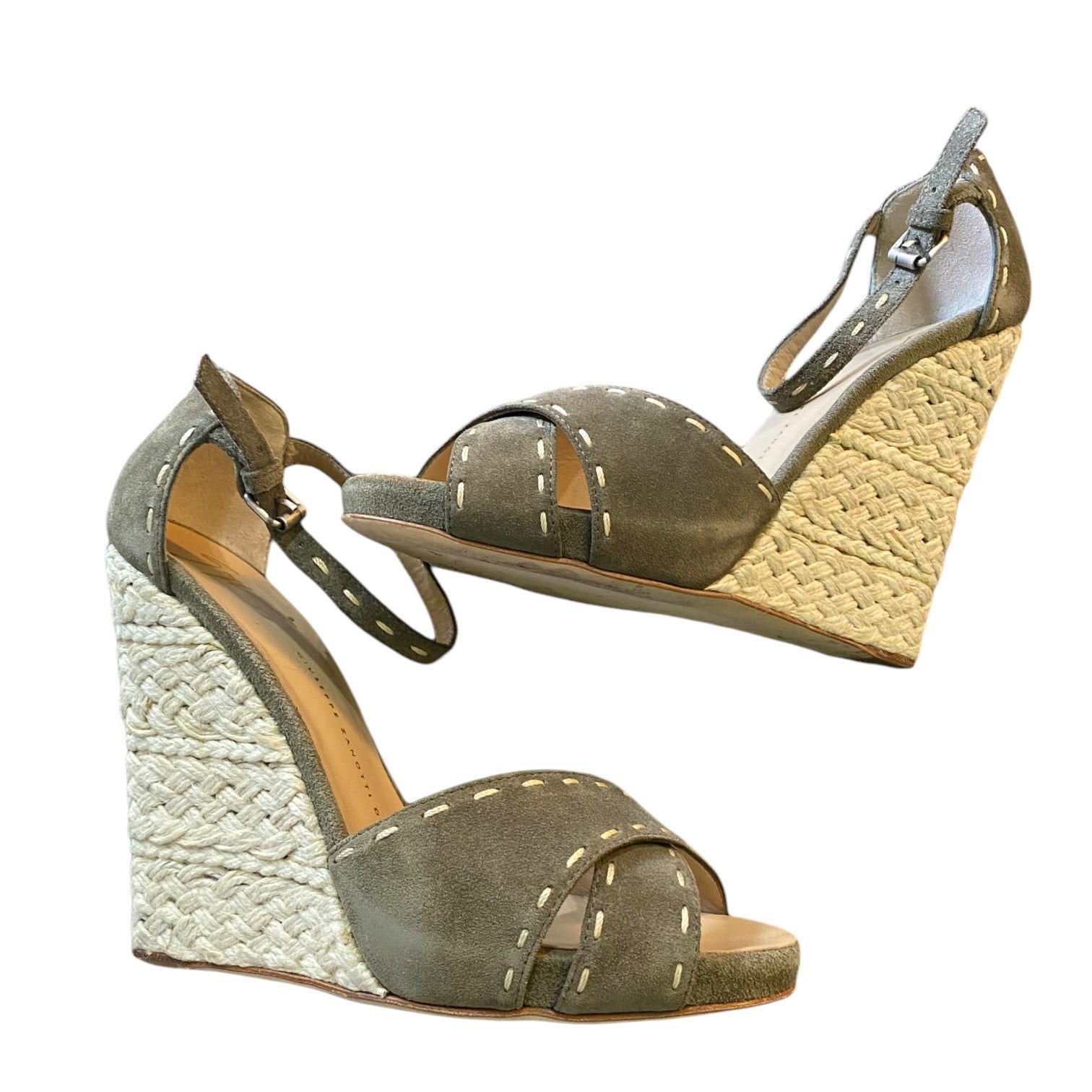 Side view of Green wedge sandals with woven sole on a white background
