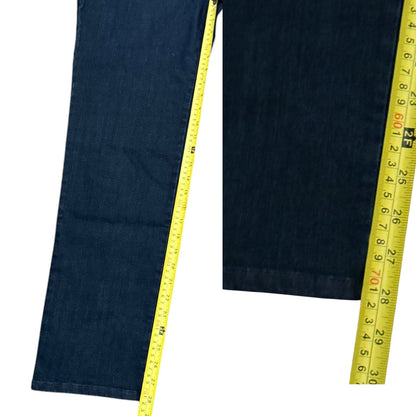 Dark blue denim jeans shown with yellow measuring tapes along both legs to indicate inseam.