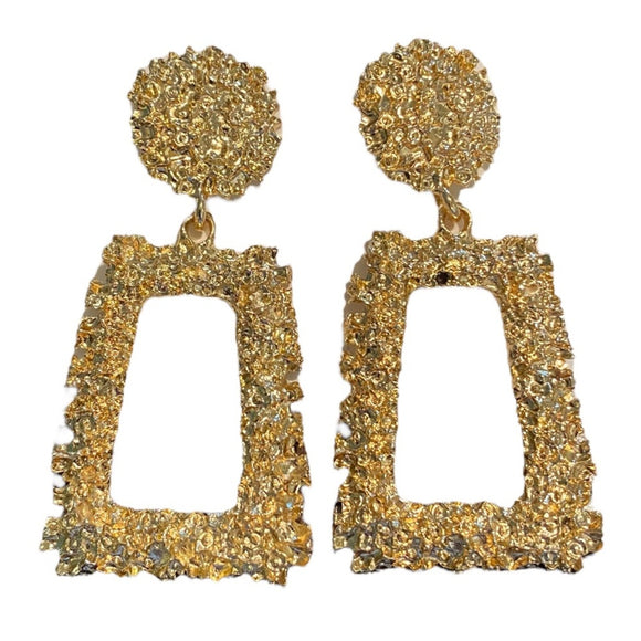 Front of chunky gold earrings