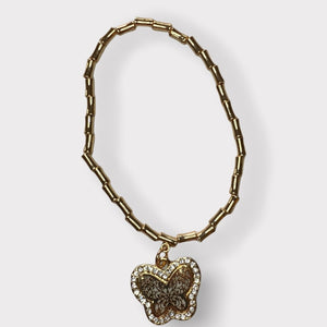 Gold tone butterfly bracelet