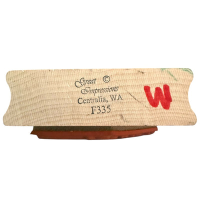 Wood stamp with 'Great Impressions' branding and a red 'W' on a white background