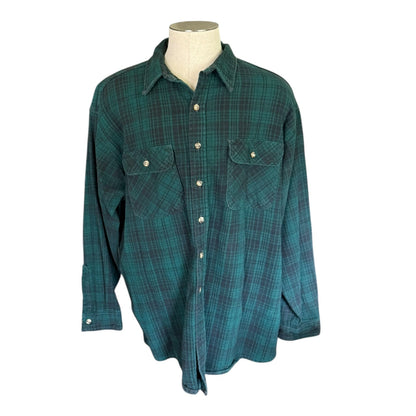 Green plaid shirt on a mannequin against a white background