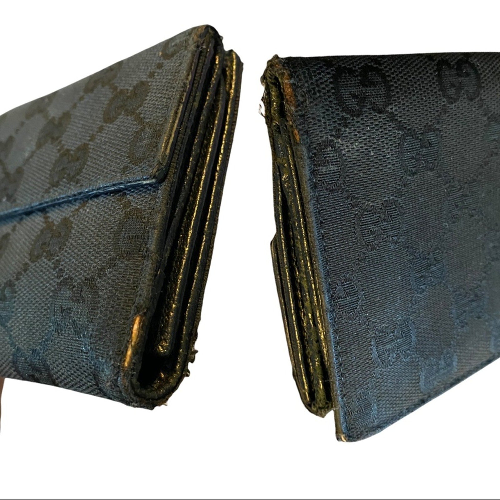 Side edges of black wallet on a white background