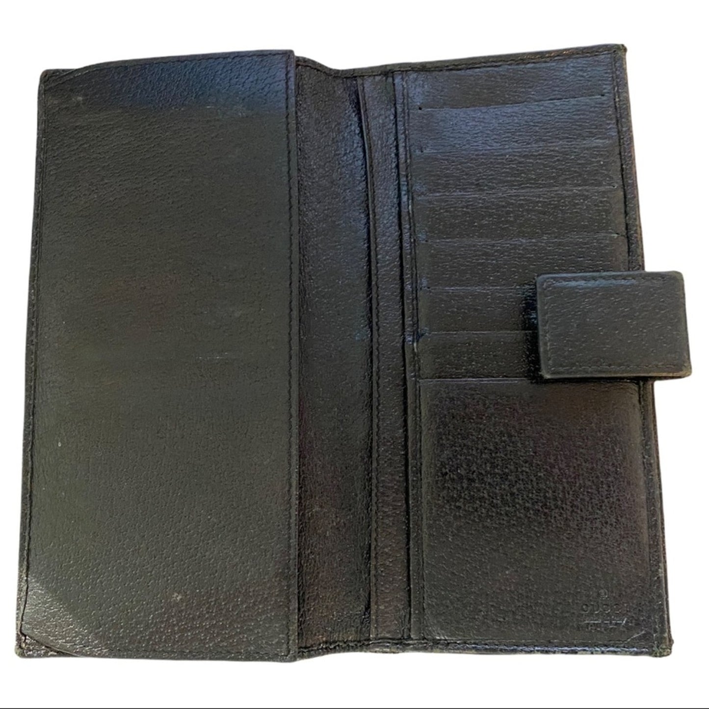 Interior of Gucci Black leather wallet on a white background