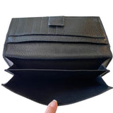 Interior cash pockets on black wallet
