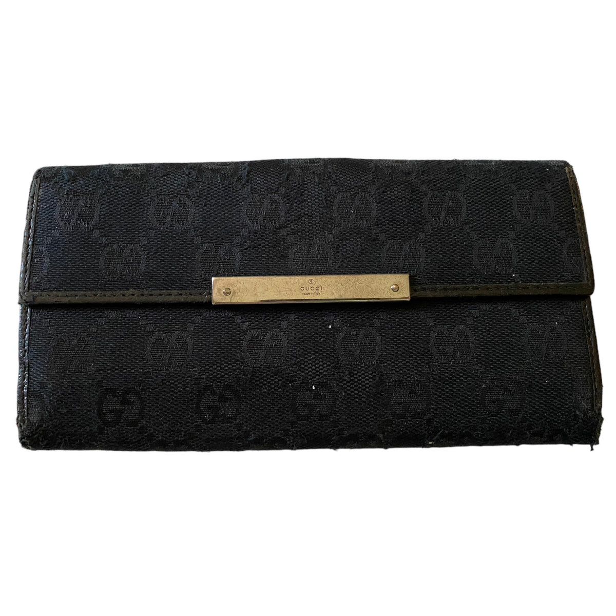 Front of black GG Gucci wallet on a white background. 