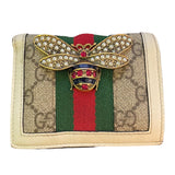 Close up of Gucci bee wallet