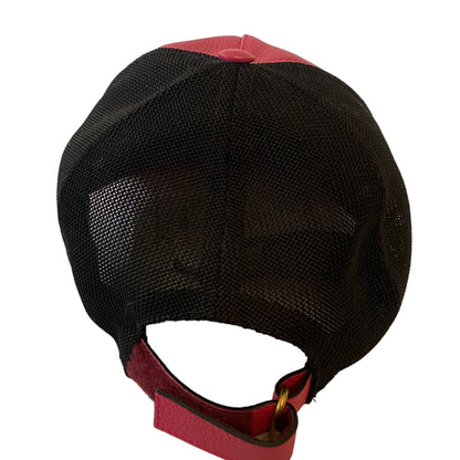 Black and pink hat with mesh back on a white background