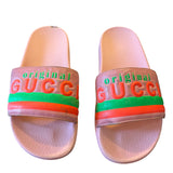 Pair of slides with 'original GUCC' text on a white background