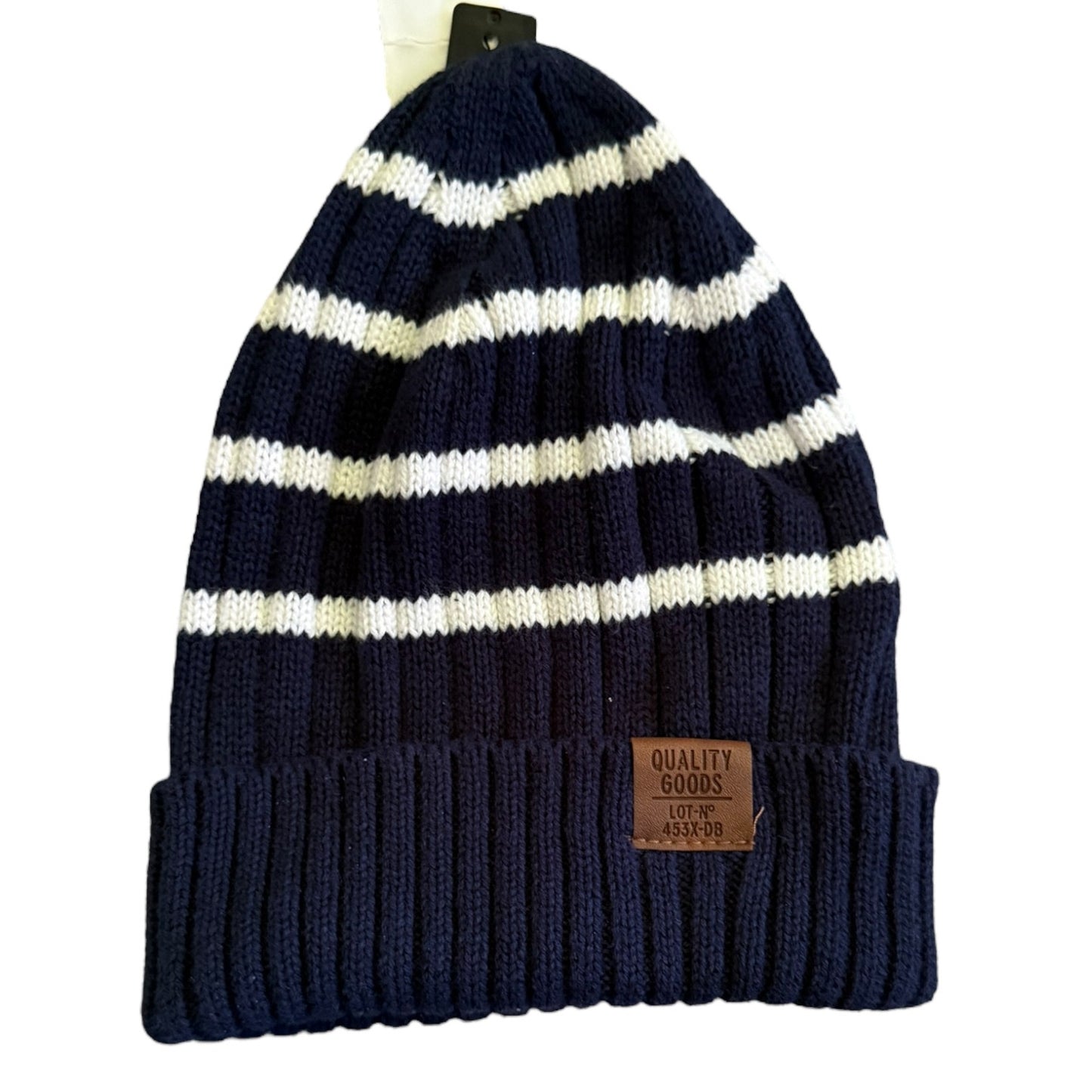 Blue and white striped beanie on a white background