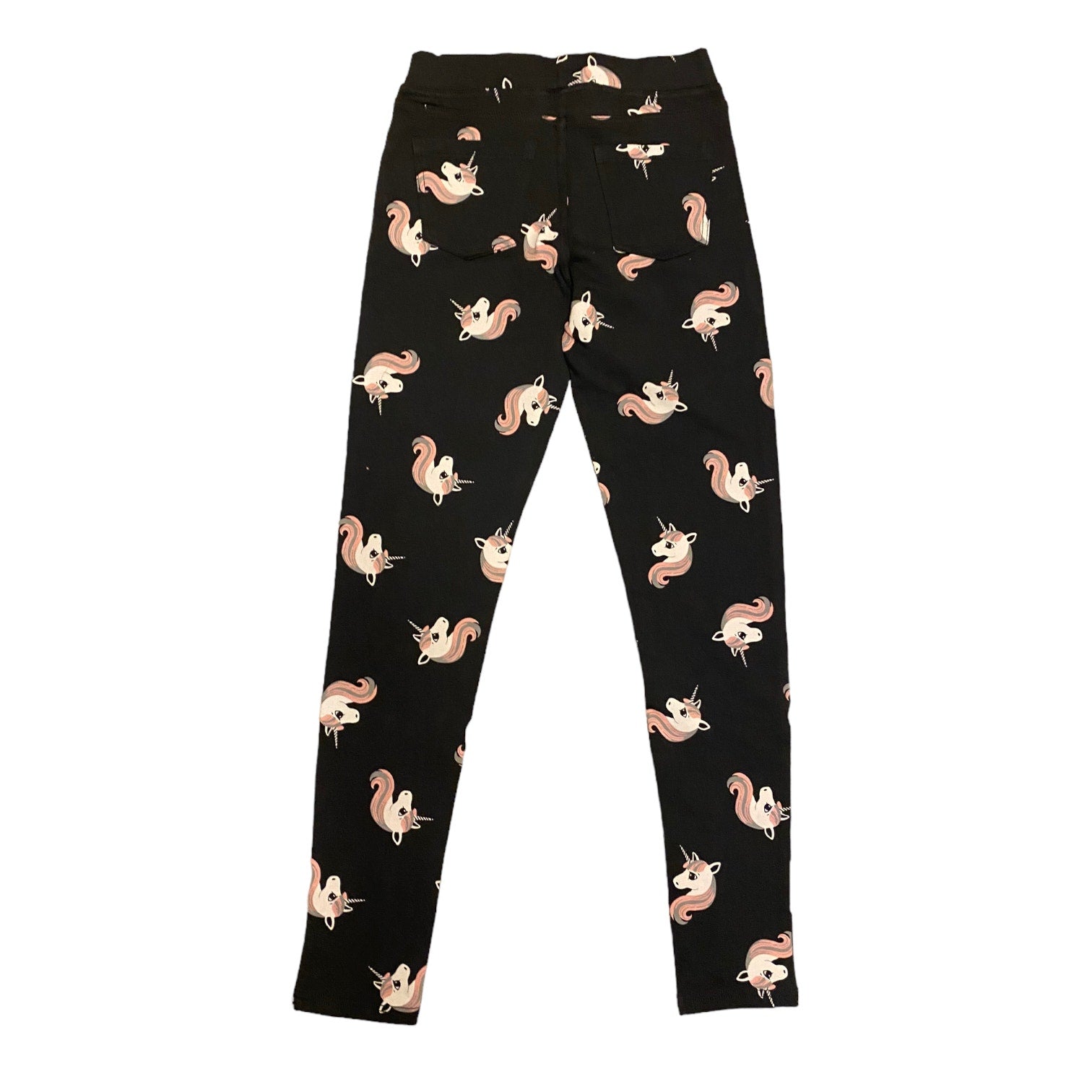 Back of dark gray jeggings with unicorns all over on a white background