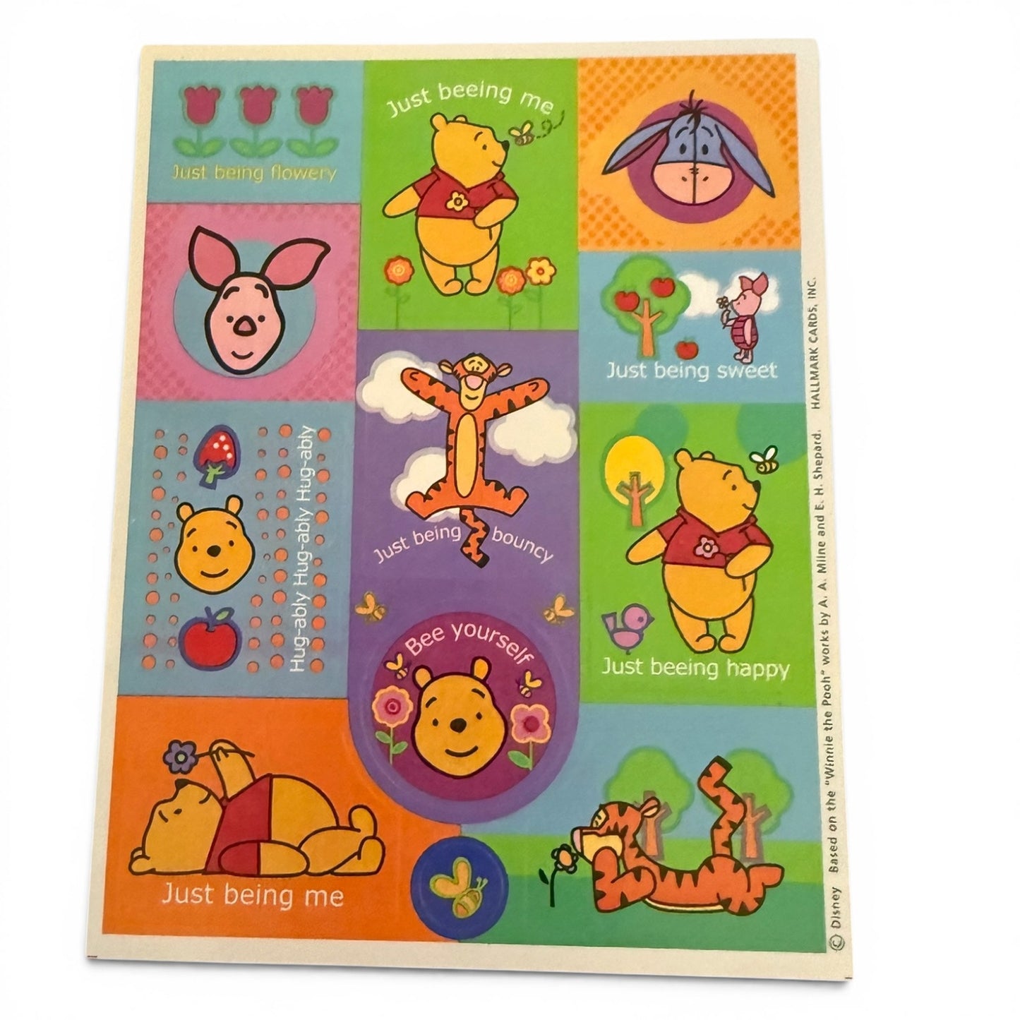Colorful stickers with Winnie the Pooh and friends on a white background