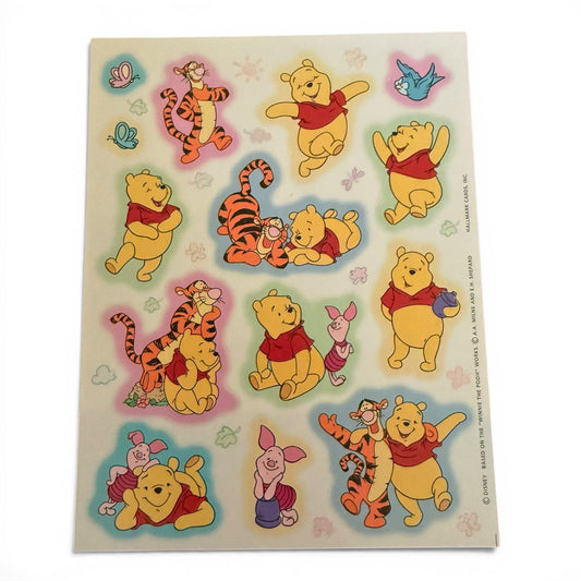 Sheet of Winnie the Pooh and friends stickers on a white background