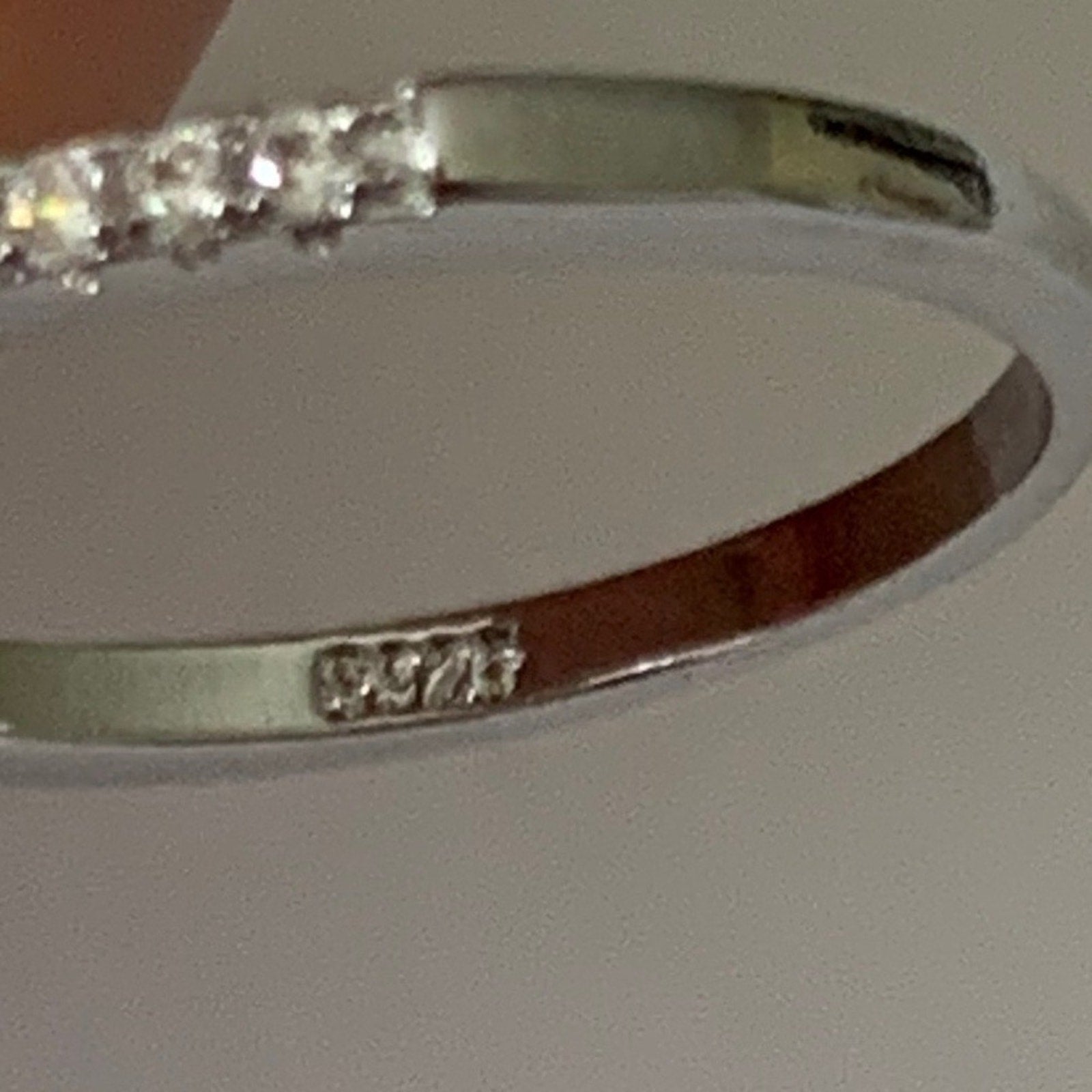 925 Silver ring with diamonds on a white background