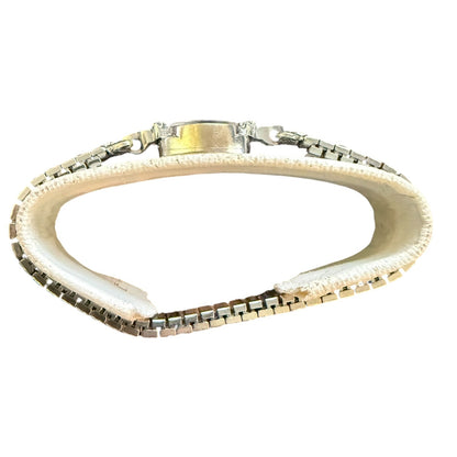 Side view of silver  White gold watch on a white background