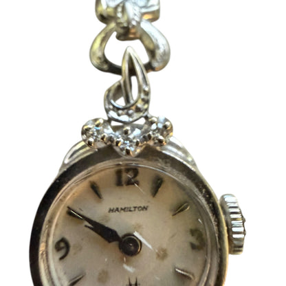 Hamilton watch with decorative edging on a white background
