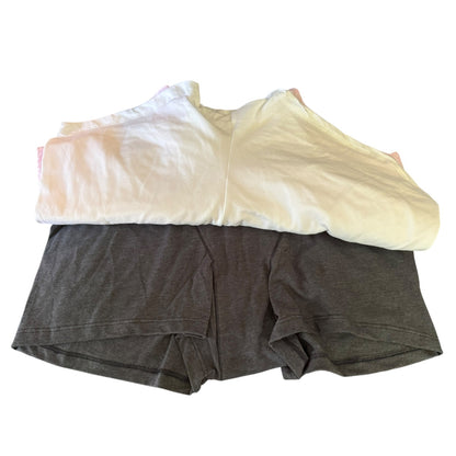 Stack of gray and white boxer briefs on a white background