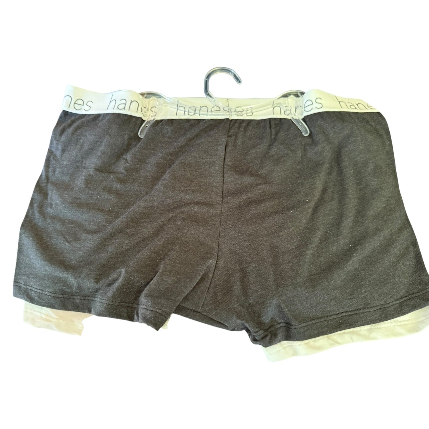 Gray boxer briefs with a hanger on a white background