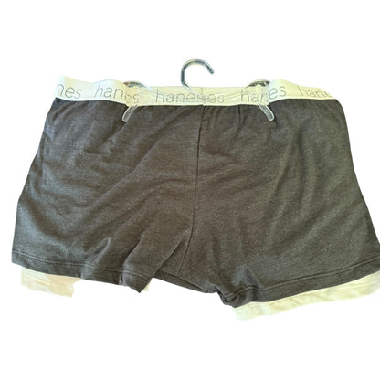Gray boxer briefs with a hanger on a white background