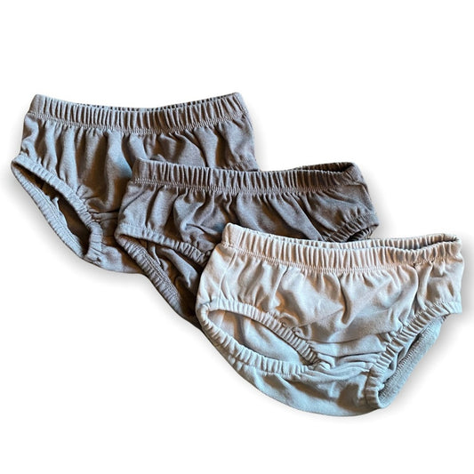 Front of 3 gray baby shorts