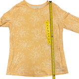 Length of yellow sun protection shirt