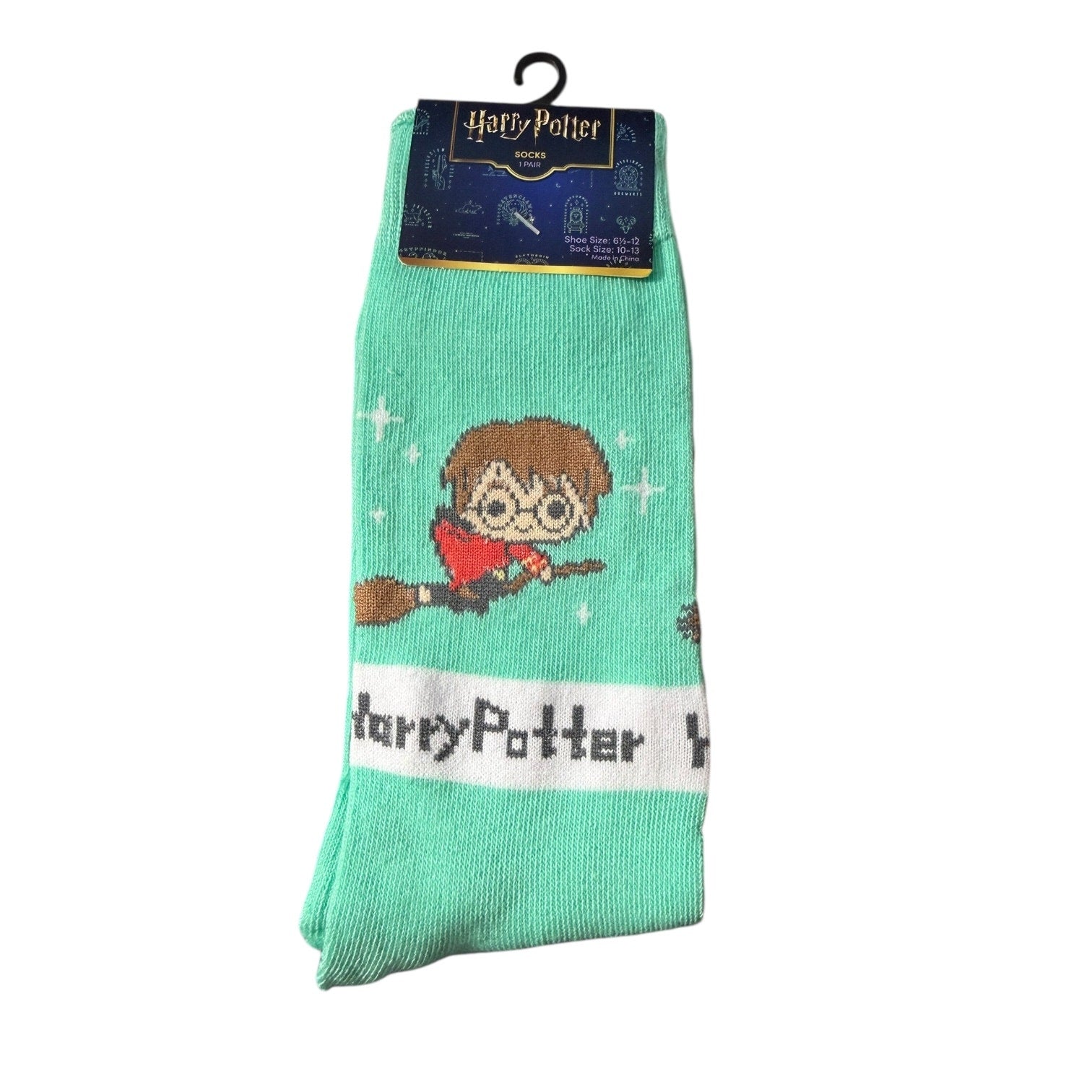 Green socks with Harry Potter design on a white background