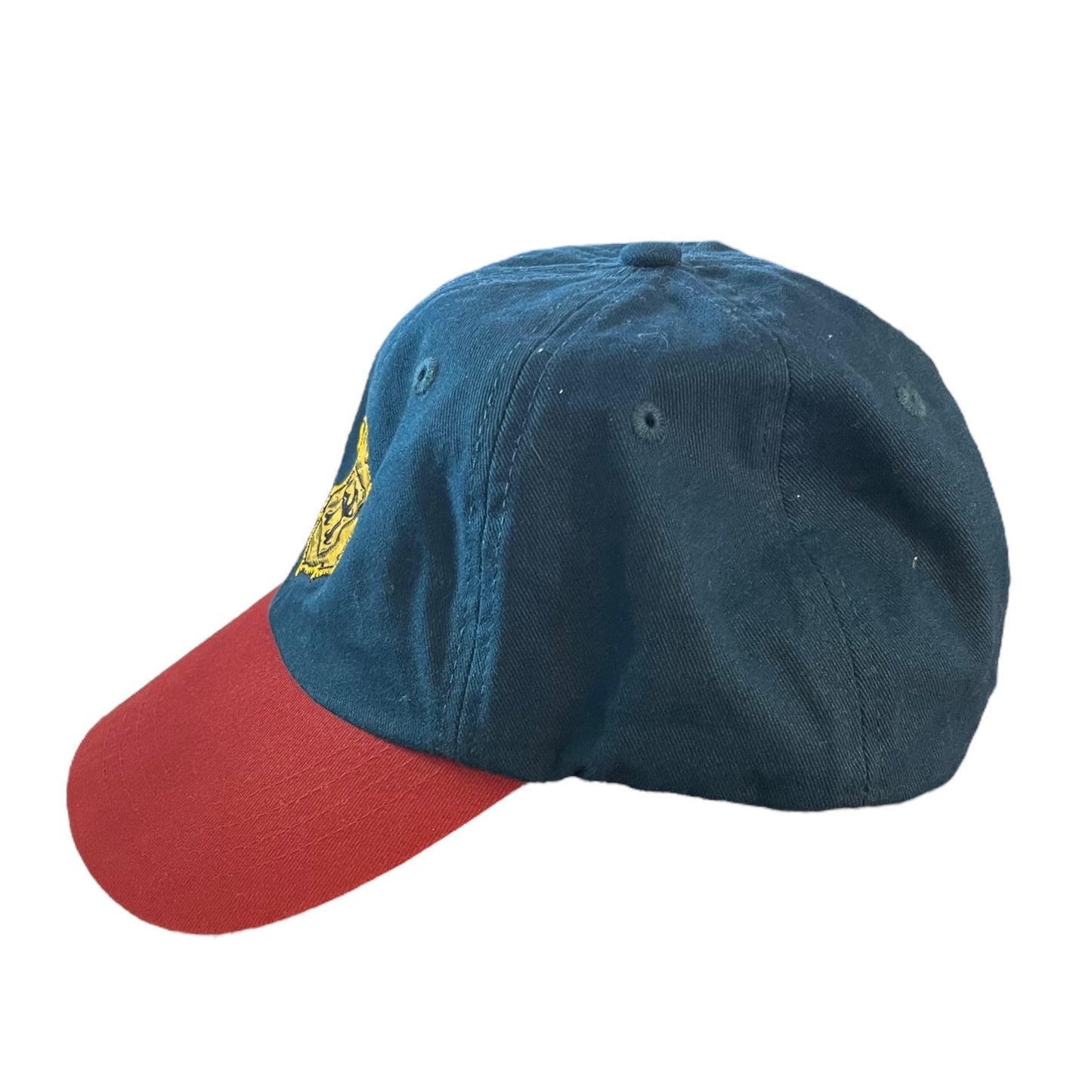 A baseball cap with a dark blue crown and a red curved brim, featuring a small yellow embroidered logo on the front.