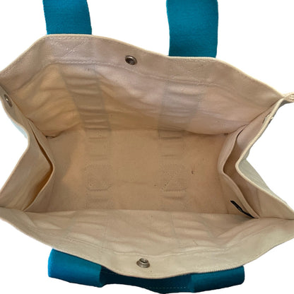 Interior of tote bag with blue accents on a white background