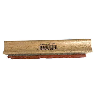 Wooden block with a barcode label on a white background