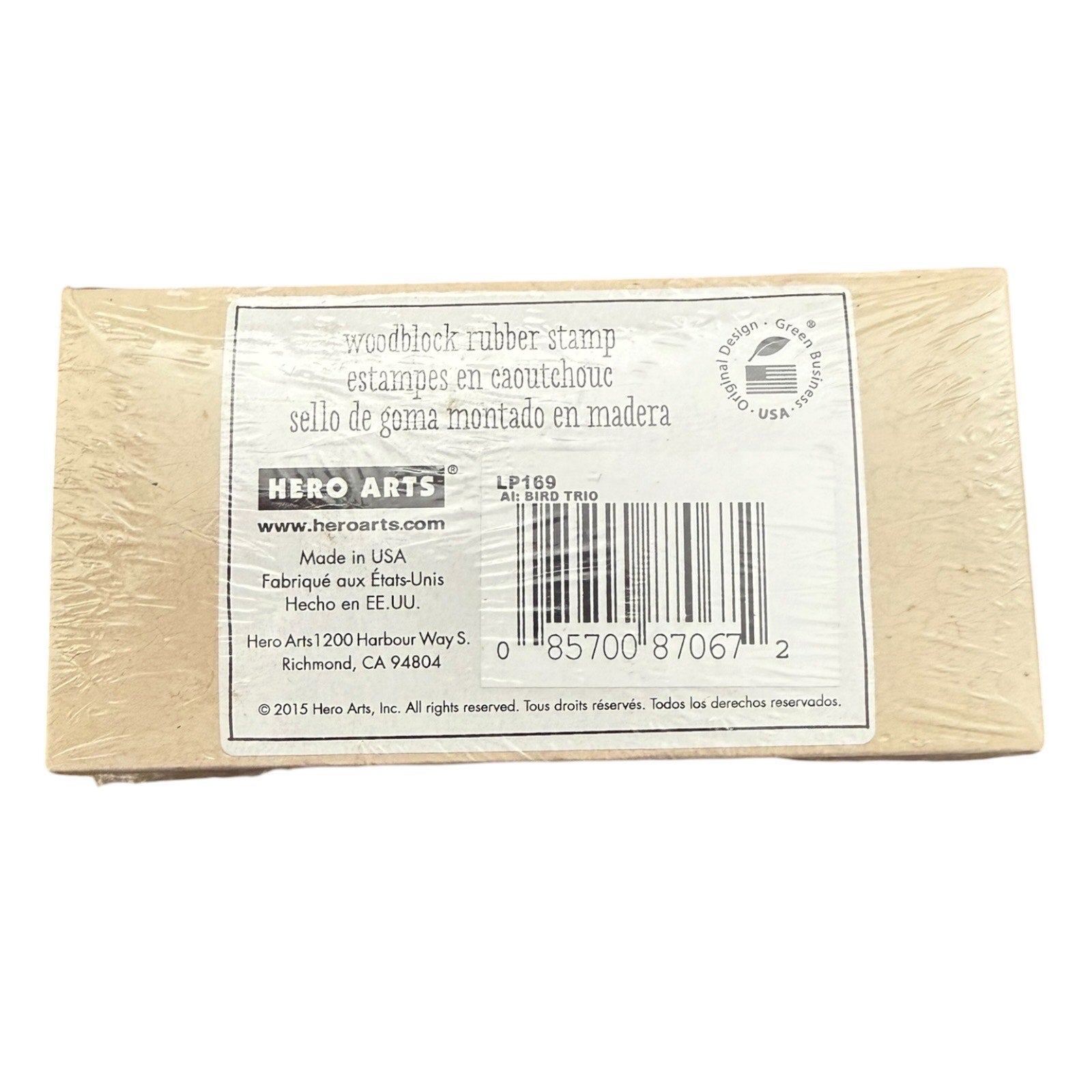 A Hero Arts woodblock rubber stamp in its original packaging, showing the back of the box with product details, a barcode, and a logo on a white background.