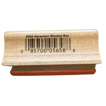 Wooden stamp with a barcode and text on a white background