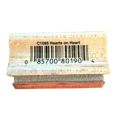 Rubber stamp with 'Hearts on Heart' text and barcode on a white background