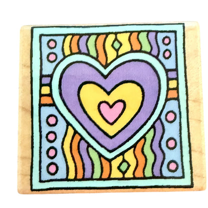 Colorful heart design on a wooden block