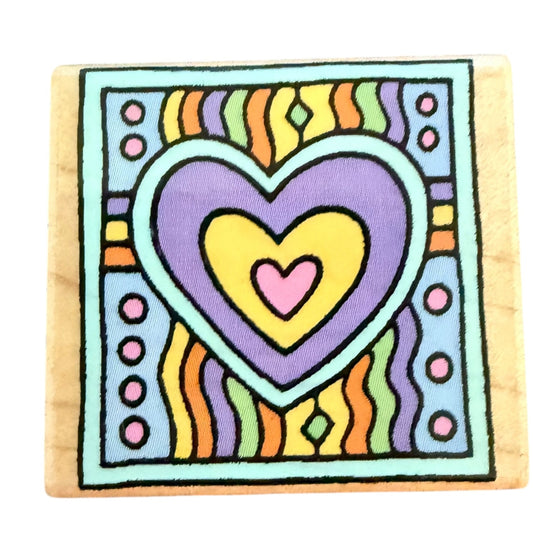 Colorful heart design on a wooden block