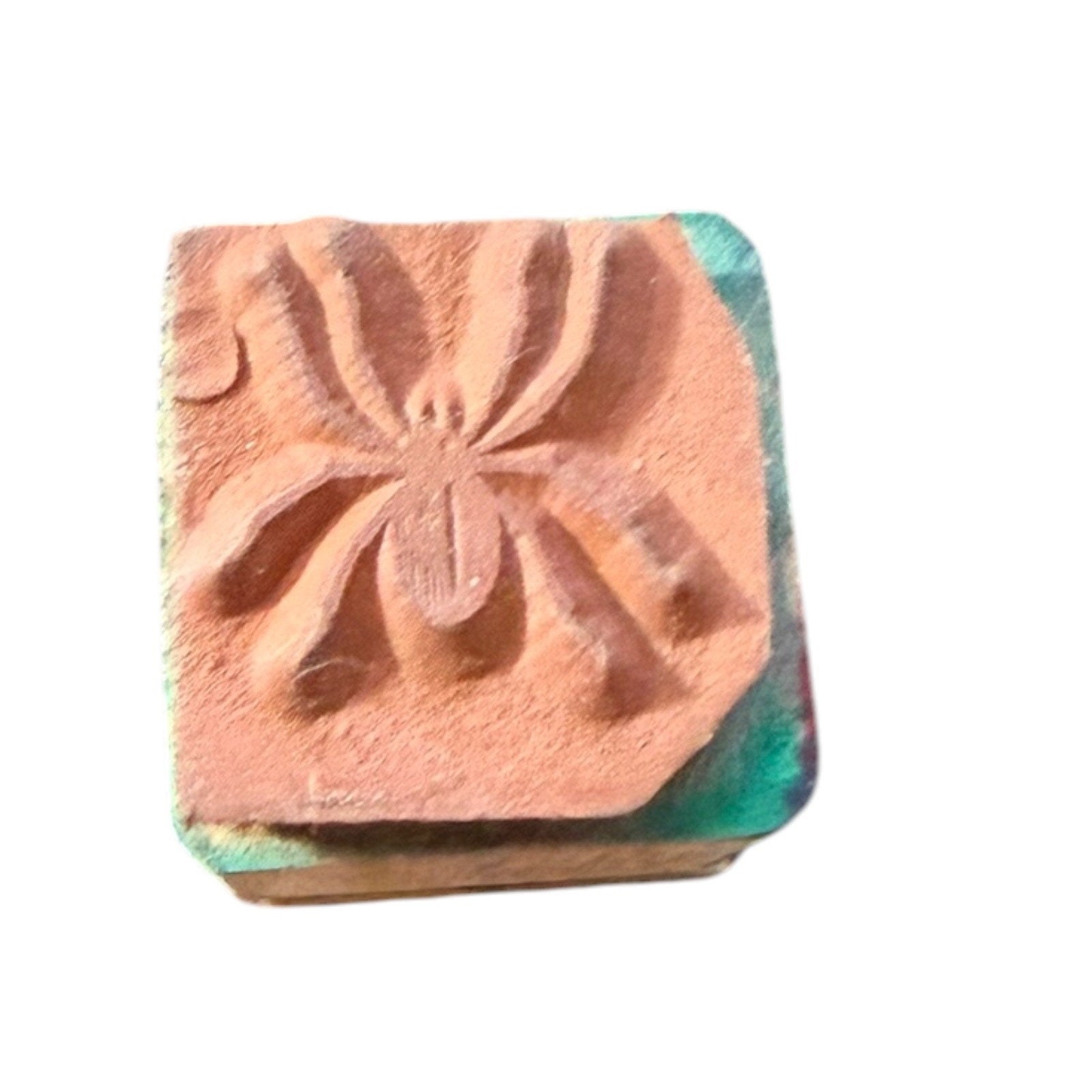 Square rubber stamp on a white background
