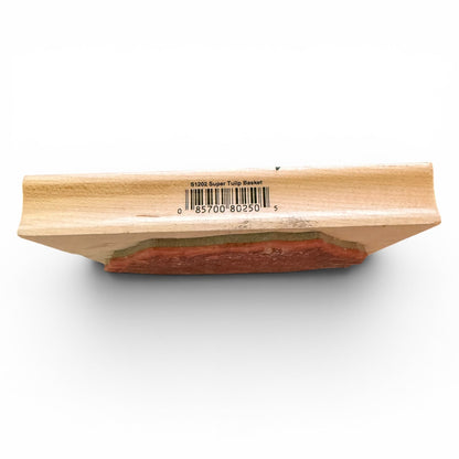 Wooden stamp with a red ink pad on a white background