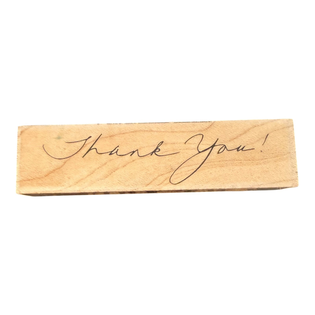 A rectangular wooden block with the words 'Thank You!' written in black cursive script, shown on a plain white background.