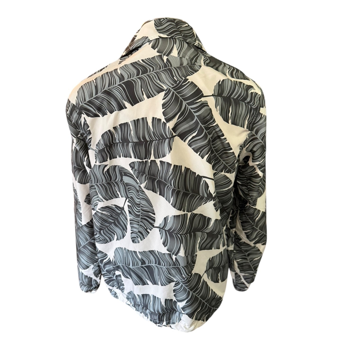 Back of palm leaf patterned jacket on a white background