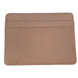 beige wallet with pockets with stitching on a white background